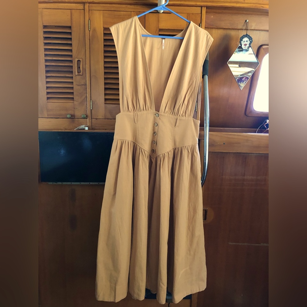 Free People pinafore dress, midi length, button up front, tie back, POCKETS.
